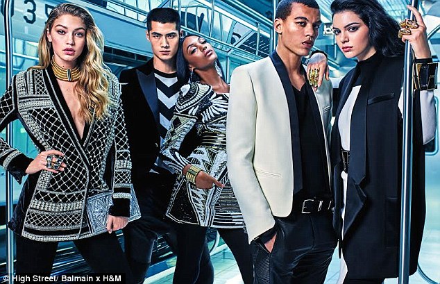 Beautiful brand: Gigi Hadid (left), Kendall Jenner (right) and Jourdan Dunn (center) joined male models Hao Yun Xiang (left) and Dudley O'Shaughnessy (right) on a subway for Balmain x H&M’s first ad 